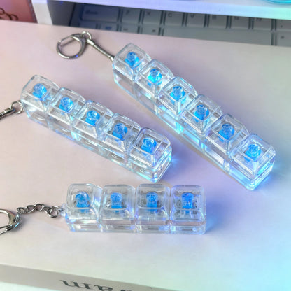 Press to release mechanical keyboard pendant