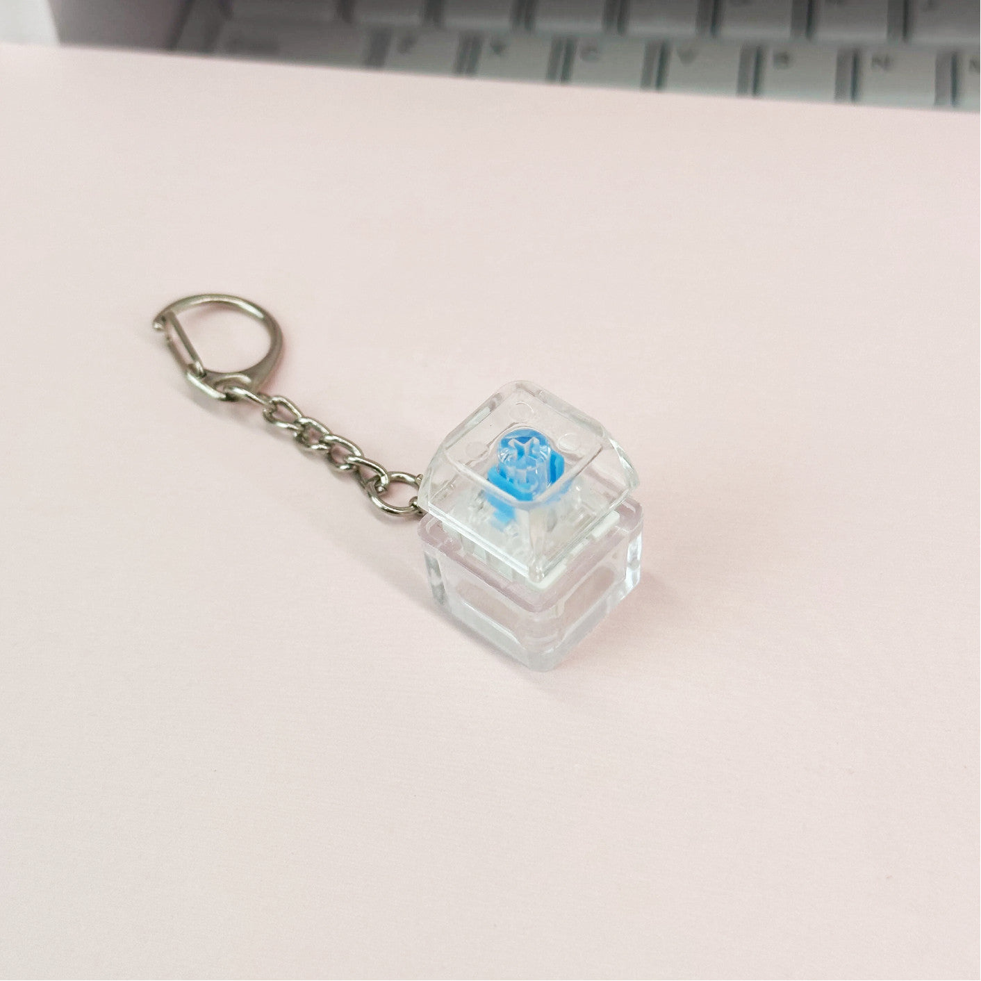 Press to release mechanical keyboard pendant
