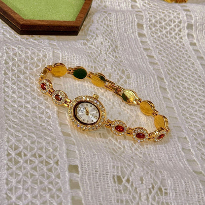 Red and Green Gemstone Watch