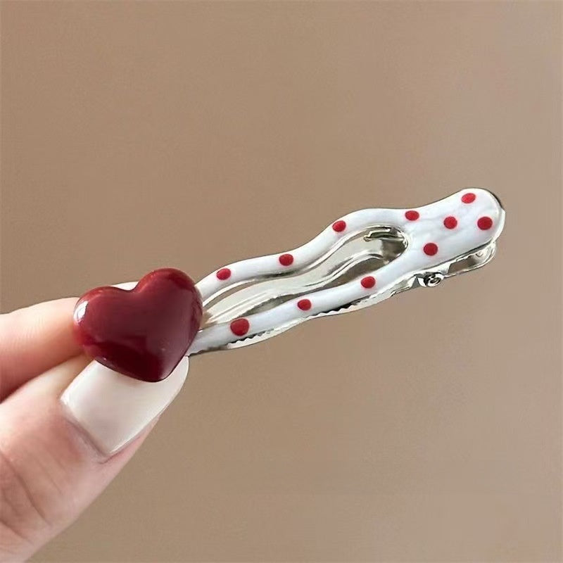 Red heart-shaped cherry polka dot hairpin