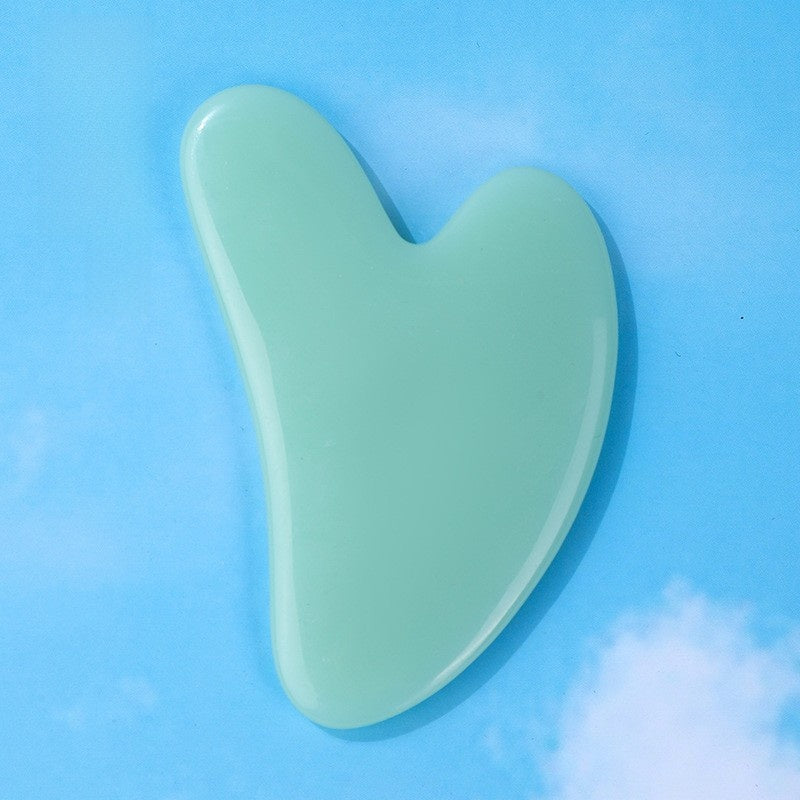 Resin facial scraping board