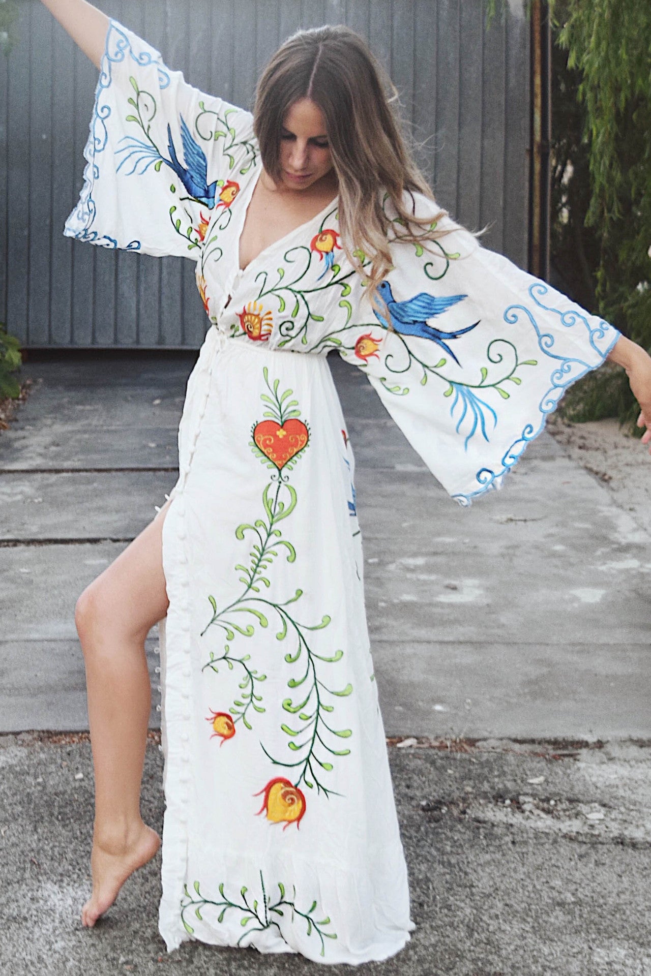Retro long dress with openwork tassel decoration