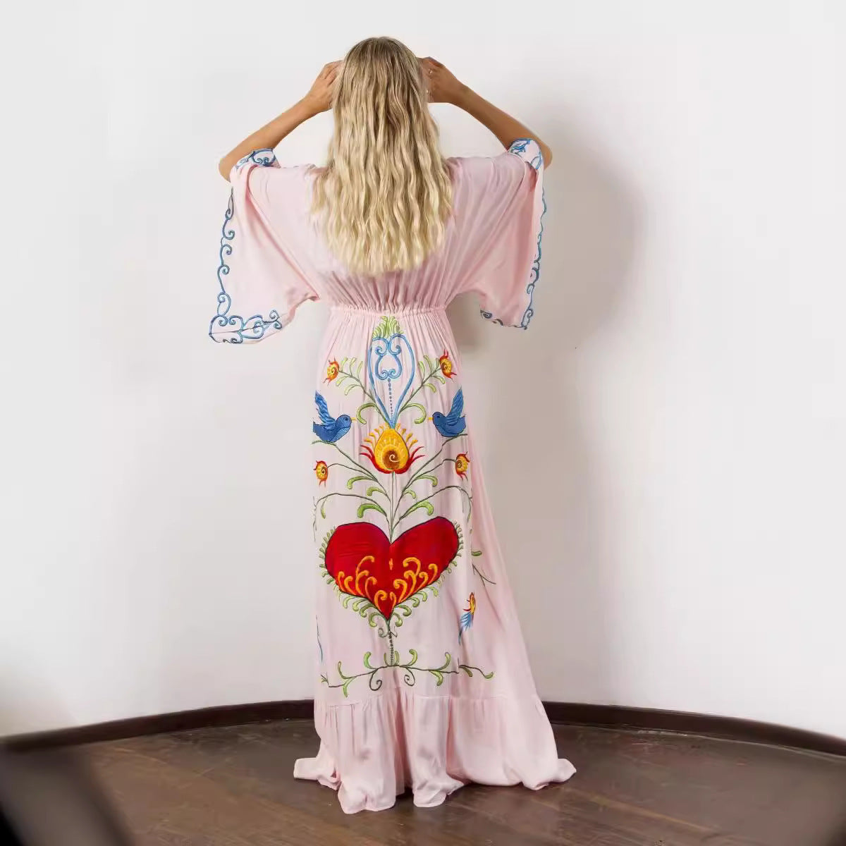 Retro long dress with openwork tassel decoration