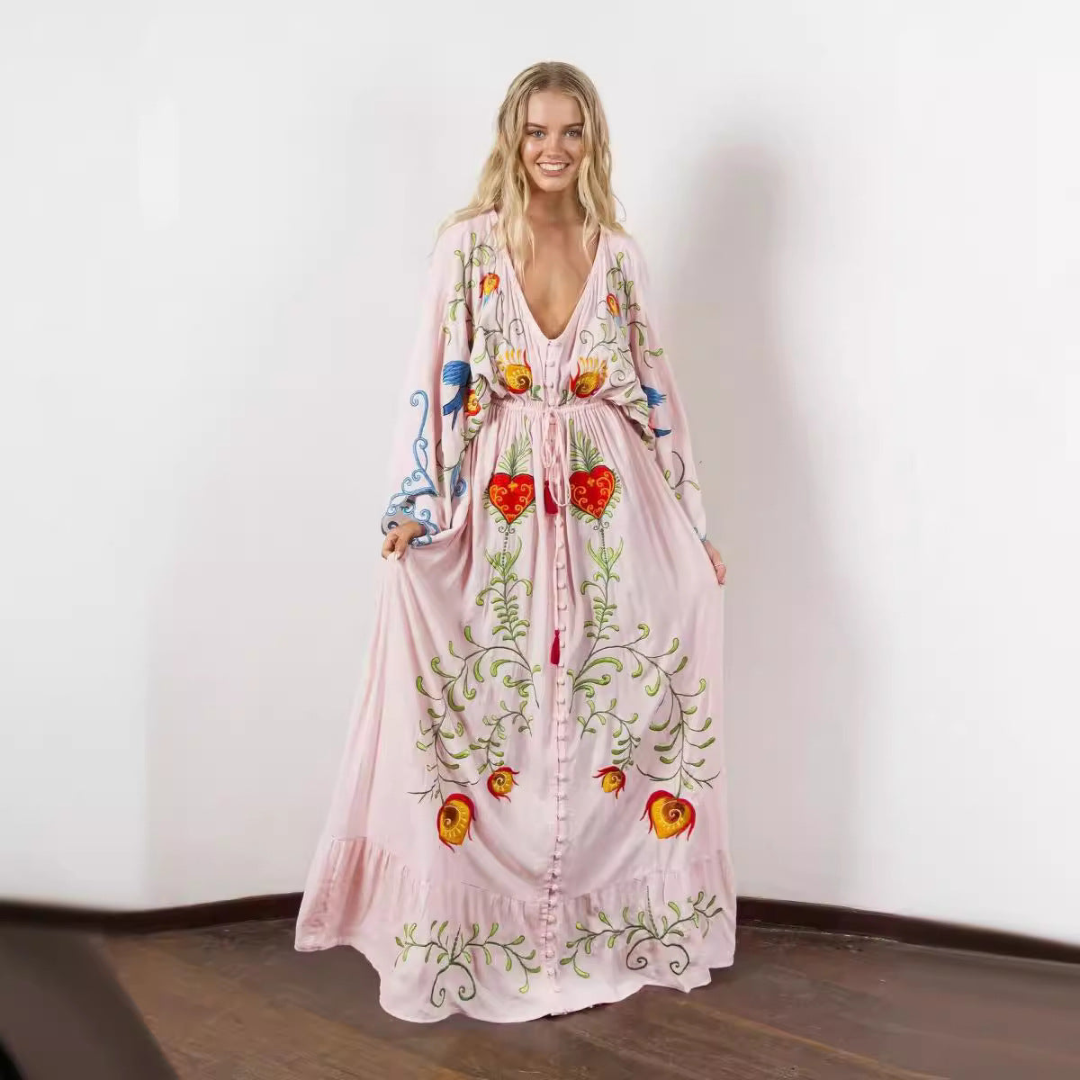 Retro long dress with openwork tassel decoration