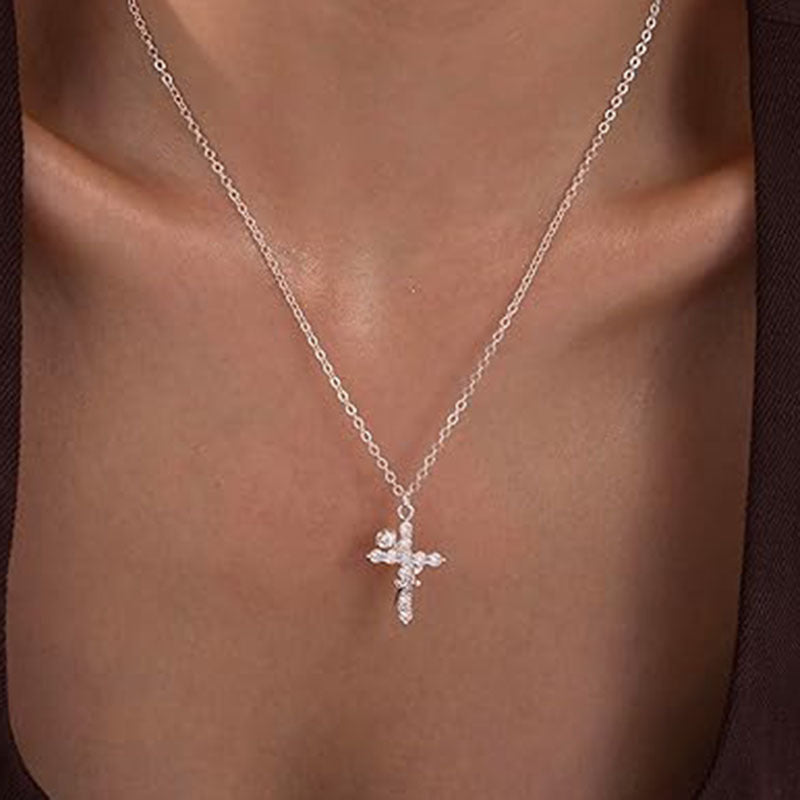 Rose-entwined cross pendant