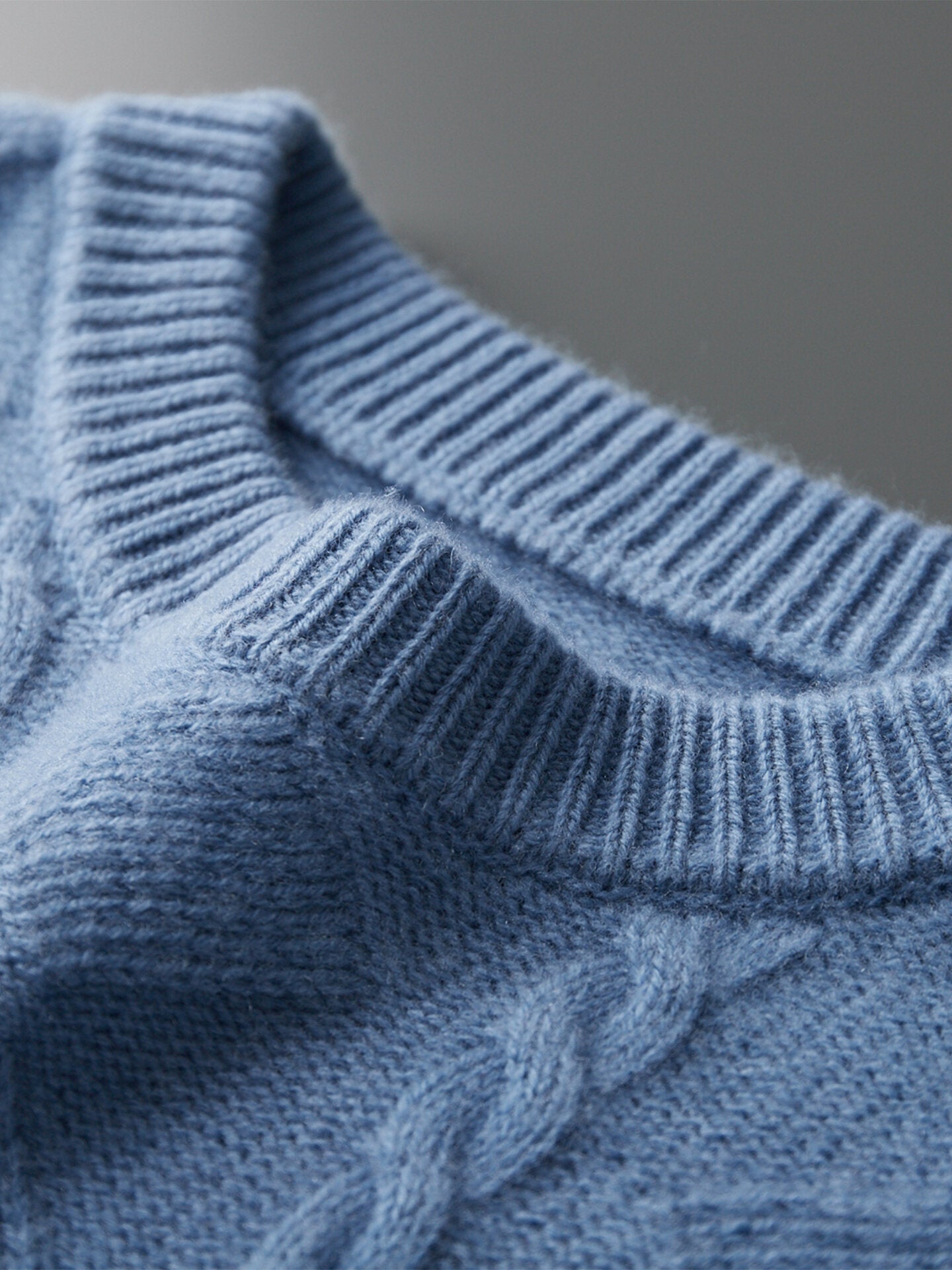 Round-neck knitted wool sweater