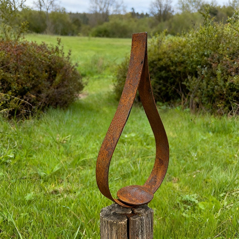 Rusty iron candlestick