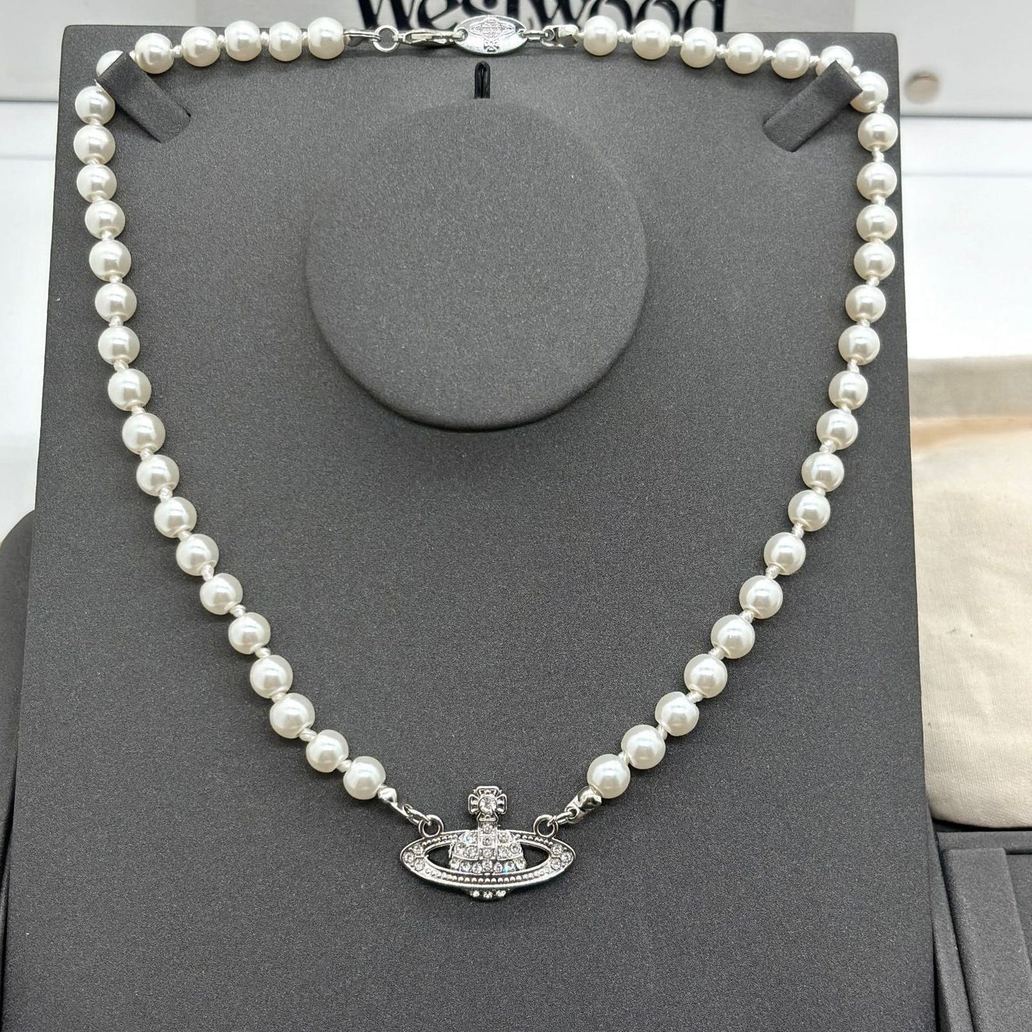 Saturn Pearl Necklace