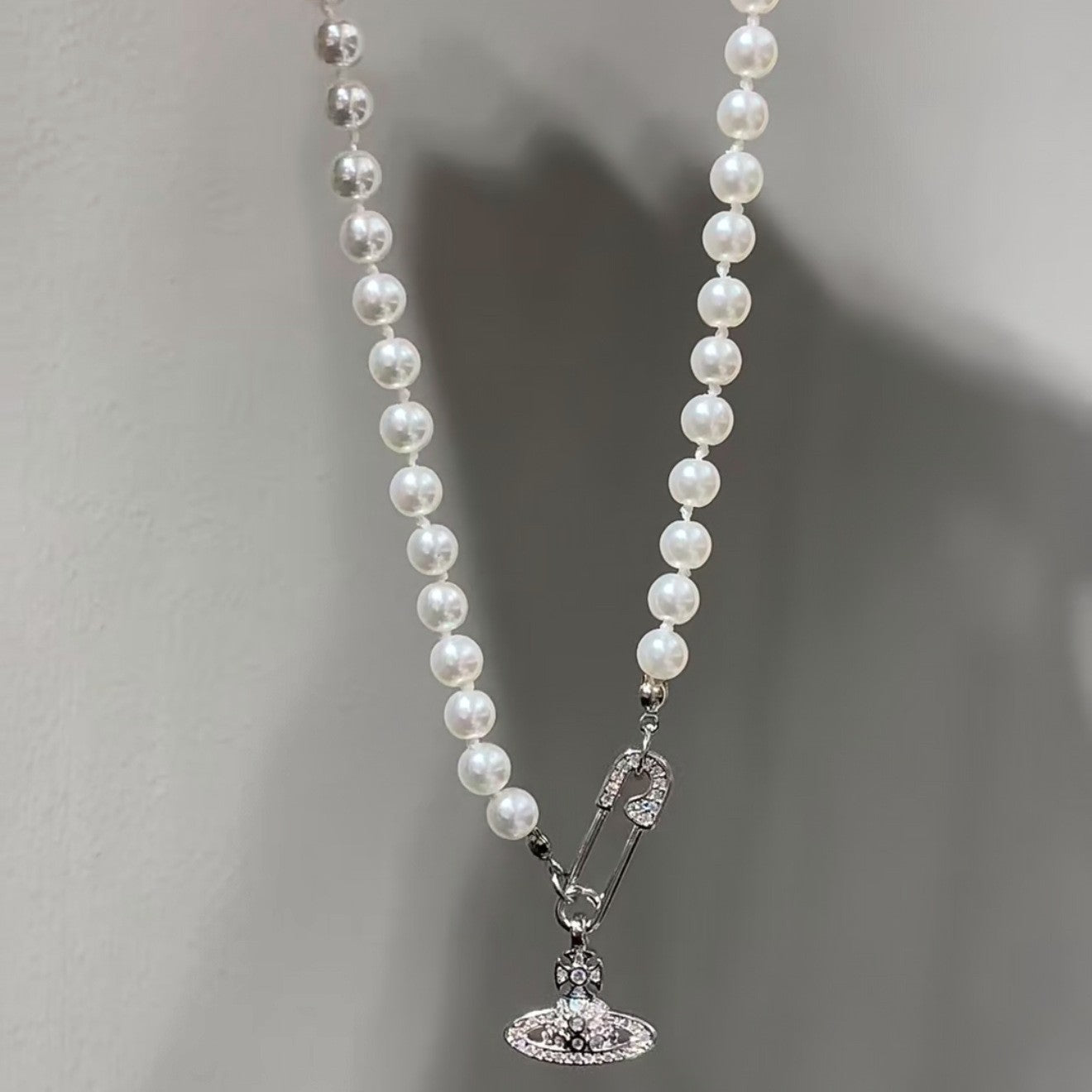 Saturn Pearl Necklace