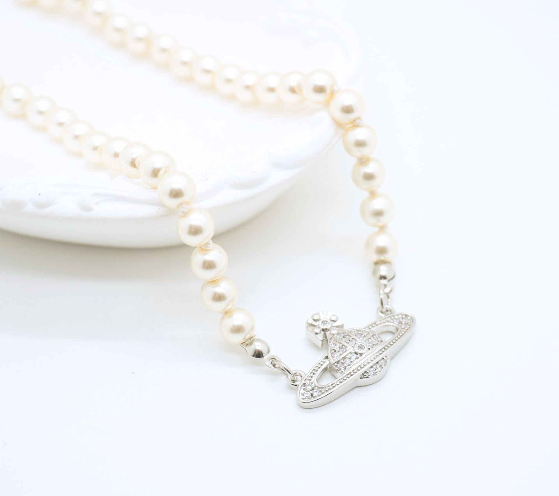 Saturn Pearl Necklace