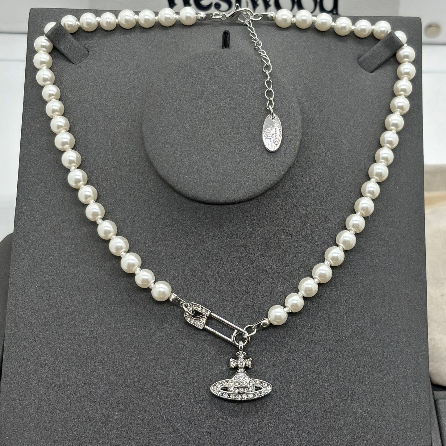 Saturn Pearl Necklace