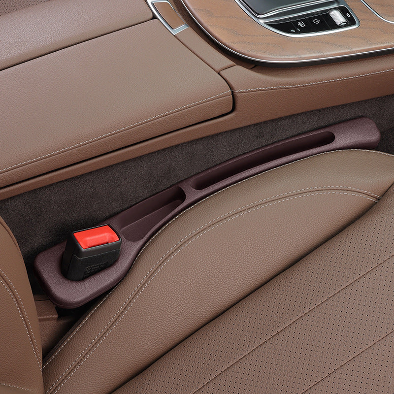 Seat gap filler strip