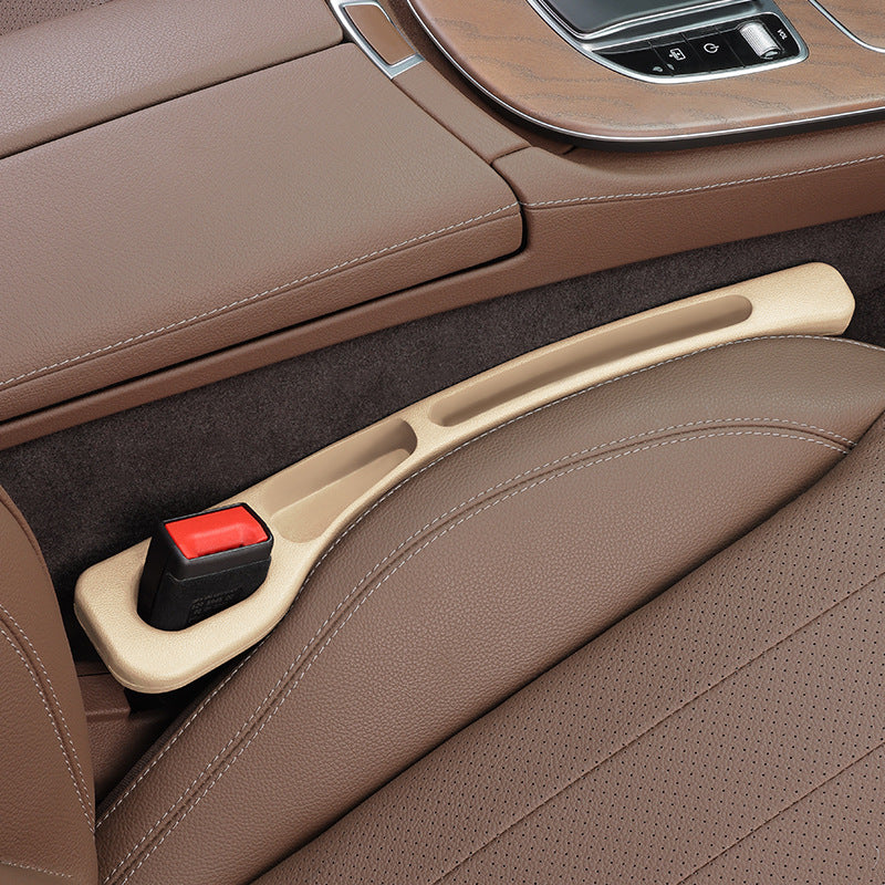 Seat gap filler strip