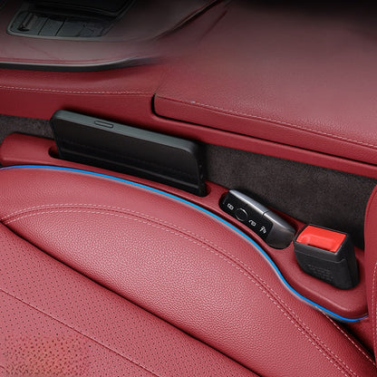 Seat gap filler strip