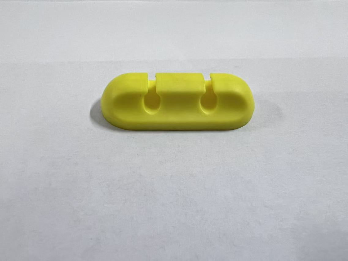 Self-adhesive silicone cable organizer for desktop wire management