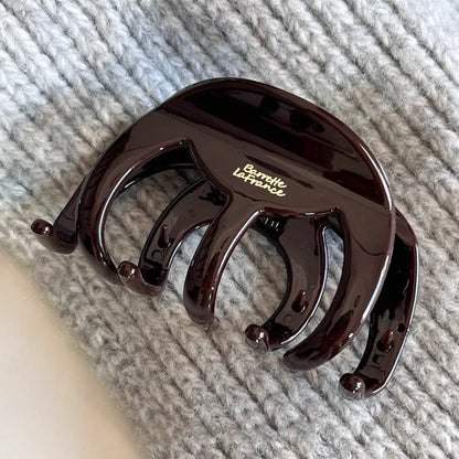 Shark clip for the back of the head