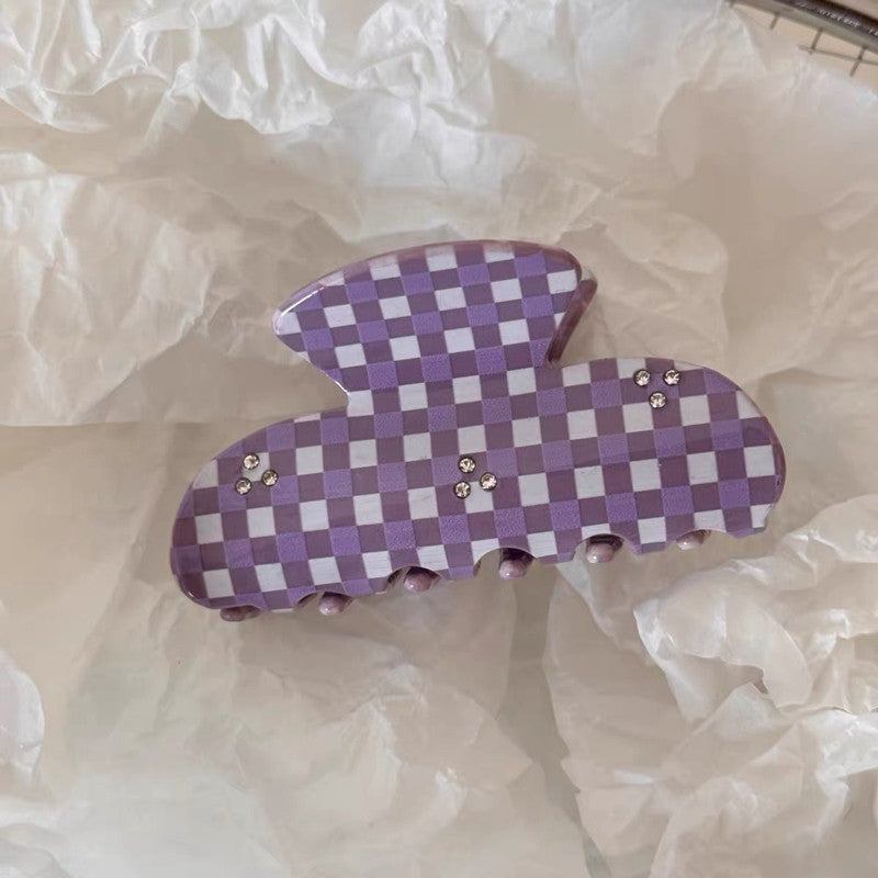 Shark clip for the back of the head