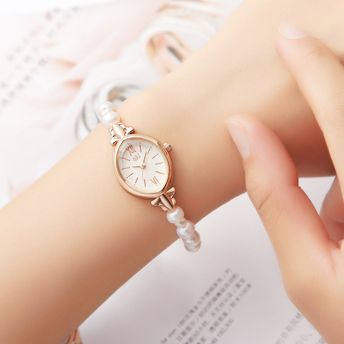 Shell and pearl watch