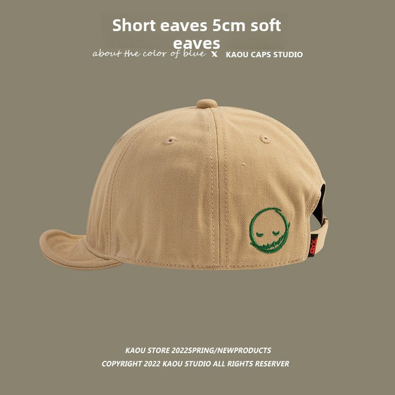 Short-brimmed cap