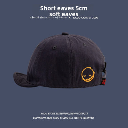 Short-brimmed cap