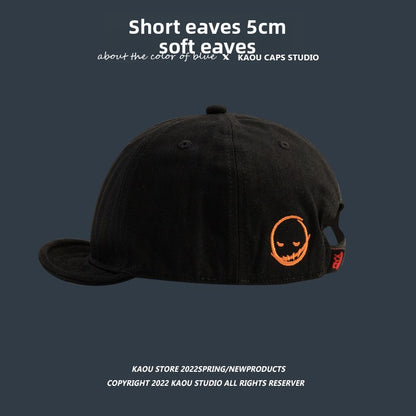 Short-brimmed cap
