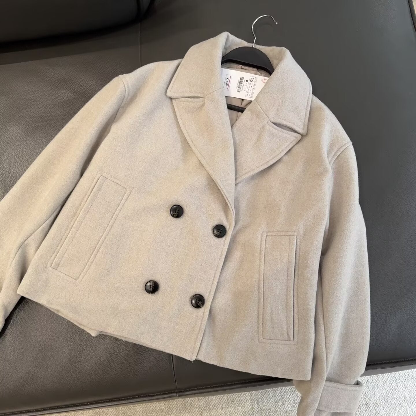 Short coat with lapel and double lapels