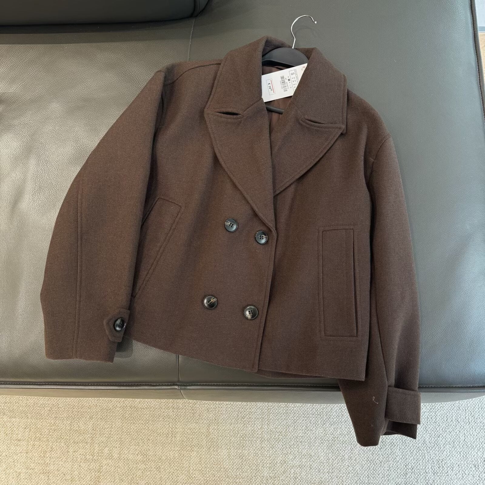 Short coat with lapel and double lapels