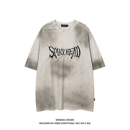 Short-sleeved T-shirt with stained patches