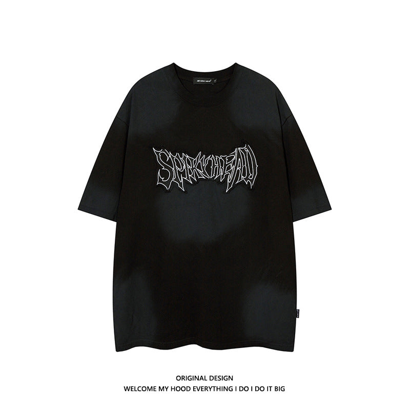 Short-sleeved T-shirt with stained patches
