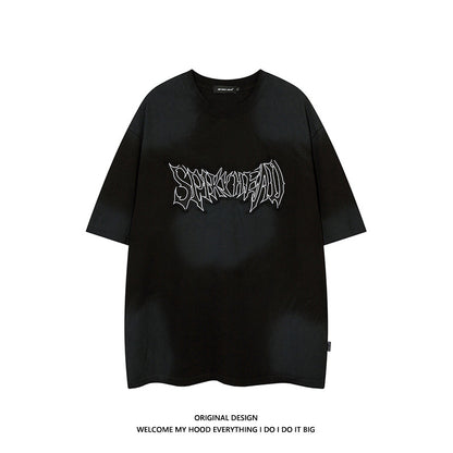Short-sleeved T-shirt with stained patches