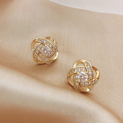 Silver needle hollowed-out circular earrings