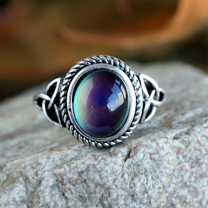 Silver-plated black egg-shaped ring