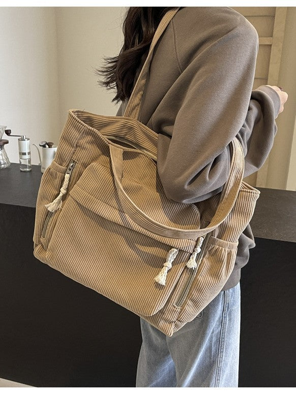 Simple corduroy tote bag for women, large capacity, suitable for daily commuting.