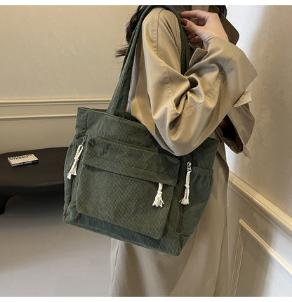 Simple corduroy tote bag for women, large capacity, suitable for daily commuting.