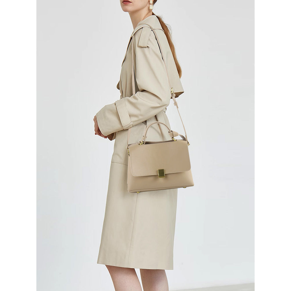 Simple solid color handbag with a slouchy shoulder strap