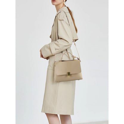 Simple solid color handbag with a slouchy shoulder strap