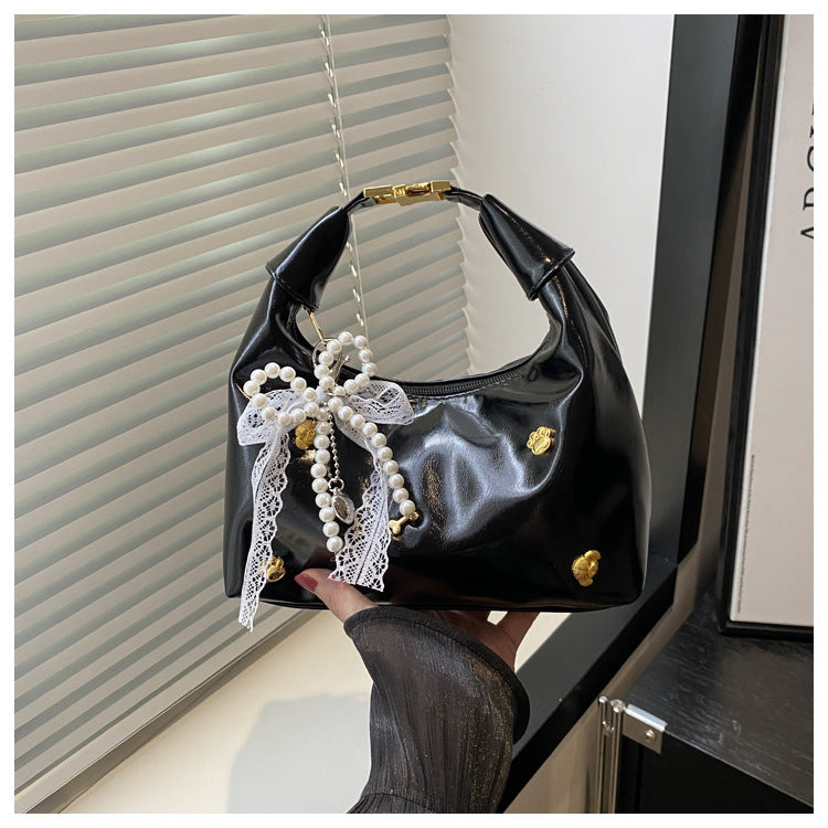 Single-shoulder crossbody bag for oil-skin dumplings