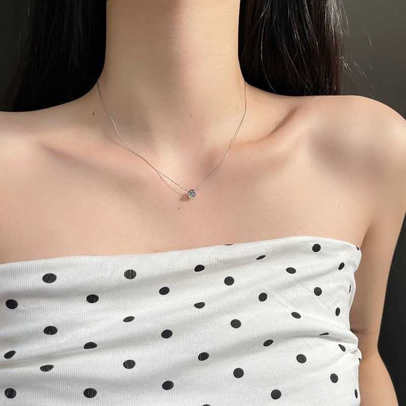 Six-prong diamond pendant necklace