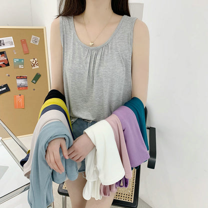 Sleeveless base layer for versatile outerwear