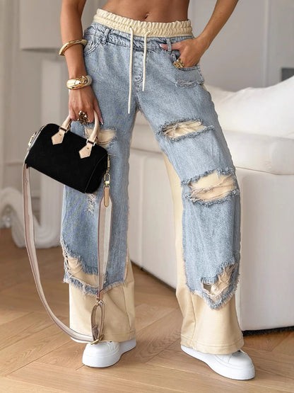 Slim-fit distressed jeans