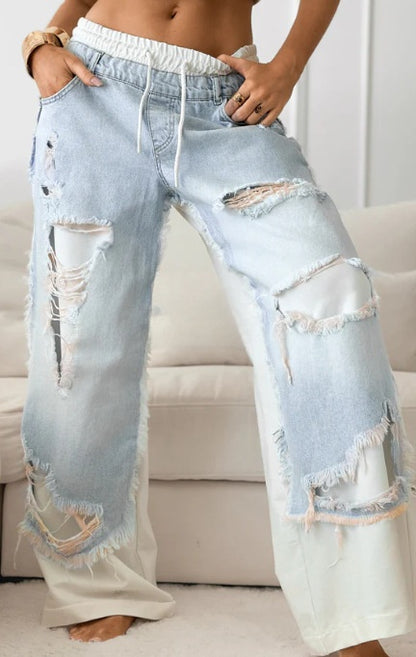 Slim-fit distressed jeans