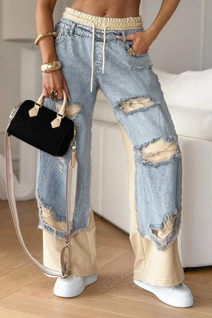 Slim-fit distressed jeans