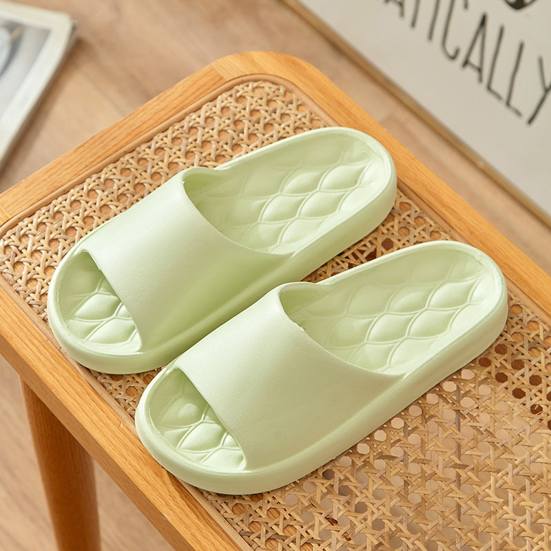 Slippers with a feeling of stepping on feces