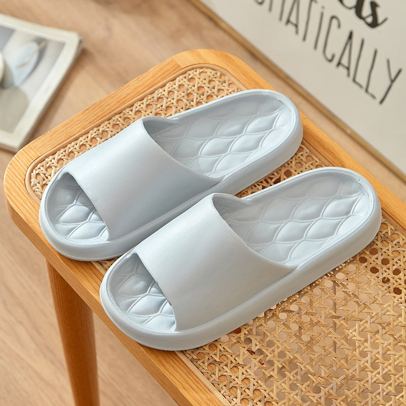 Slippers with a feeling of stepping on feces