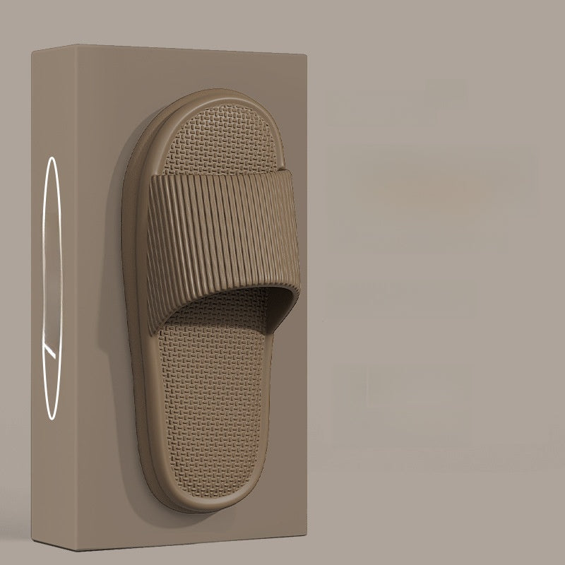 Slippers with a feeling of stepping on feces