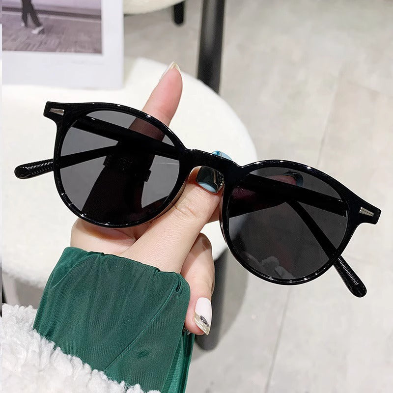Small round-framed sunglasses