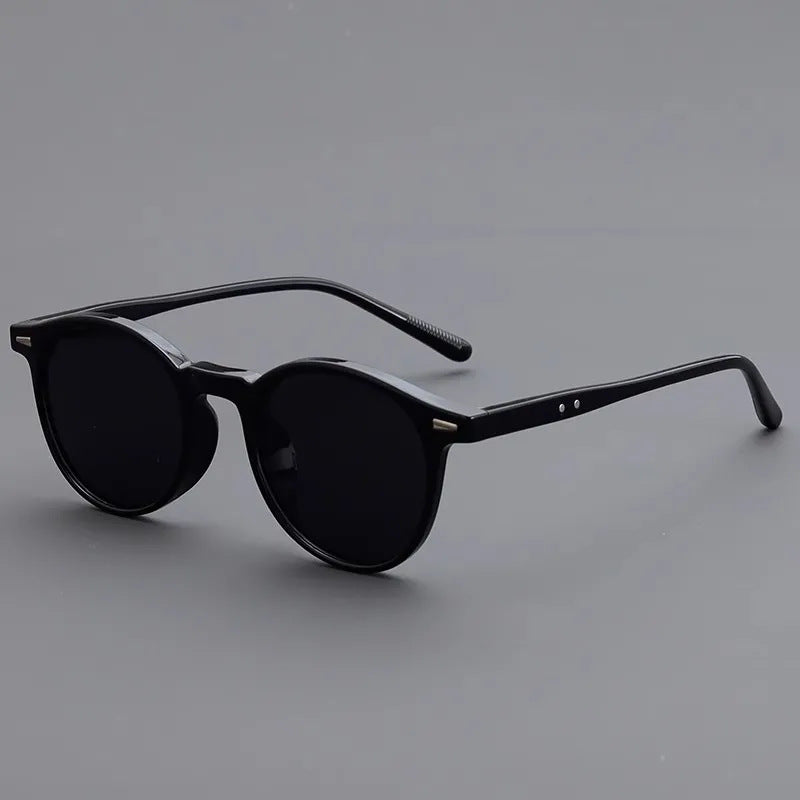 Small round-framed sunglasses