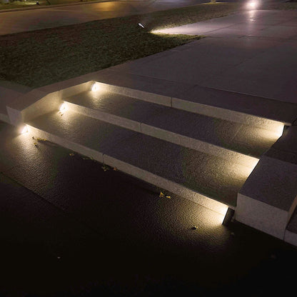 Solar-powered triangular step lamp