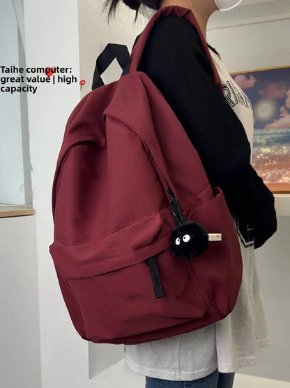 Solid-color large-capacity backpack with dual shoulder straps