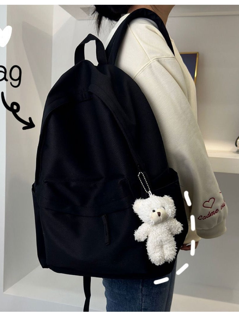 Solid-color large-capacity backpack with dual shoulder straps